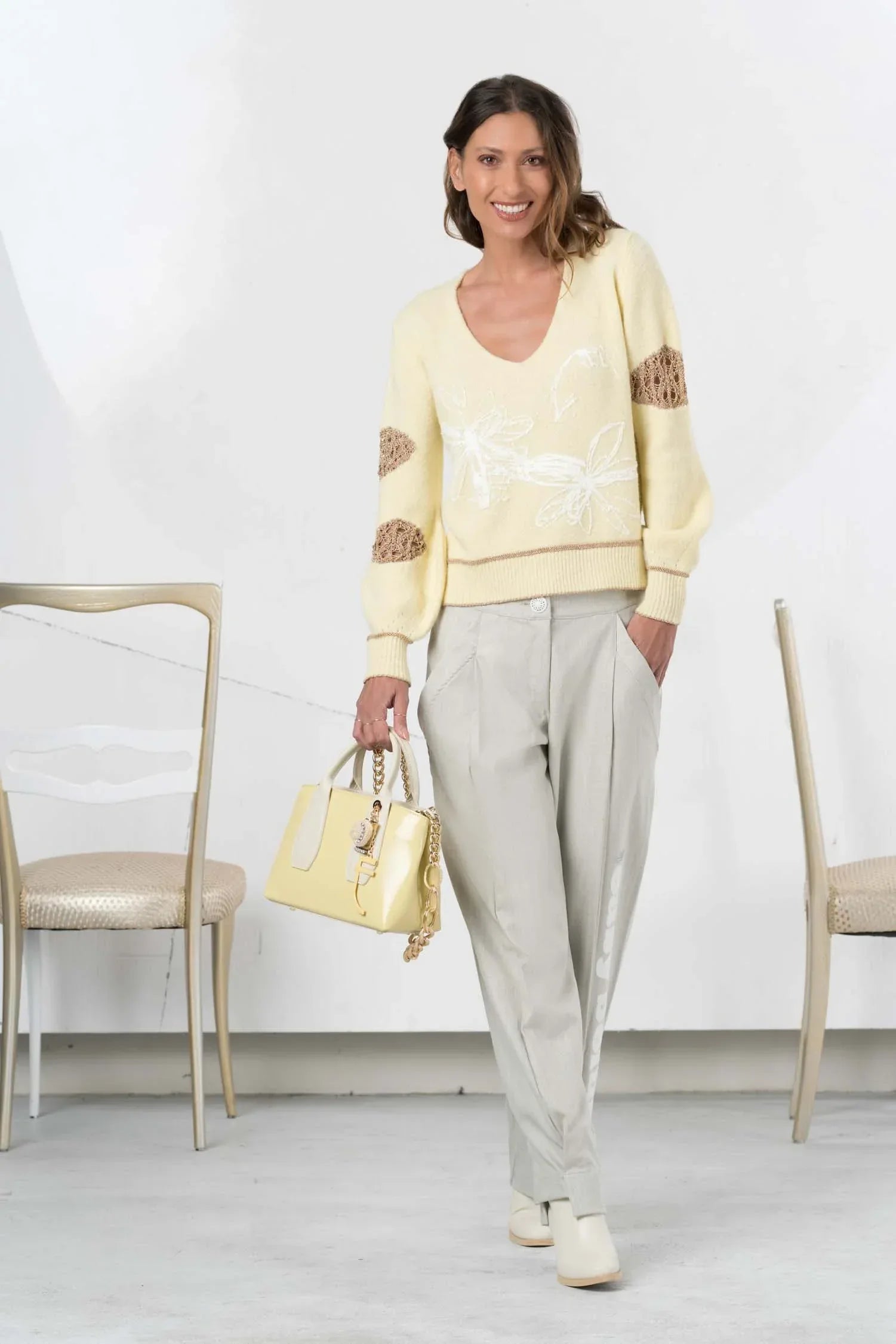Elisa Cavaletti knitted sweater in white and yellow with a textured pattern, featuring a relaxed fit and long sleeves.