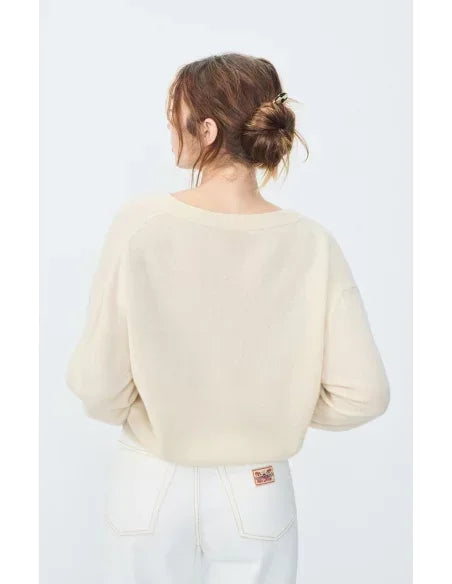 American Vintage Raxow V-neck sweater in natural color, soft knit fabric, displayed flat with smooth texture and classic neckline.
