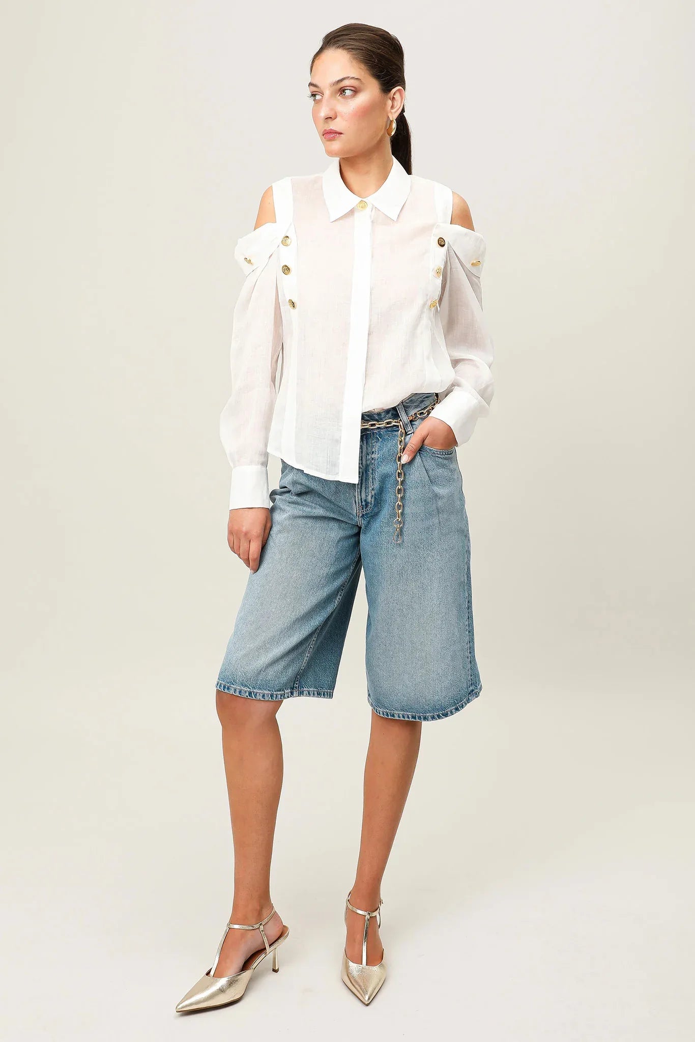 White Realm Origin Vivre Shirt laid flat, showing front view with collar and button details.