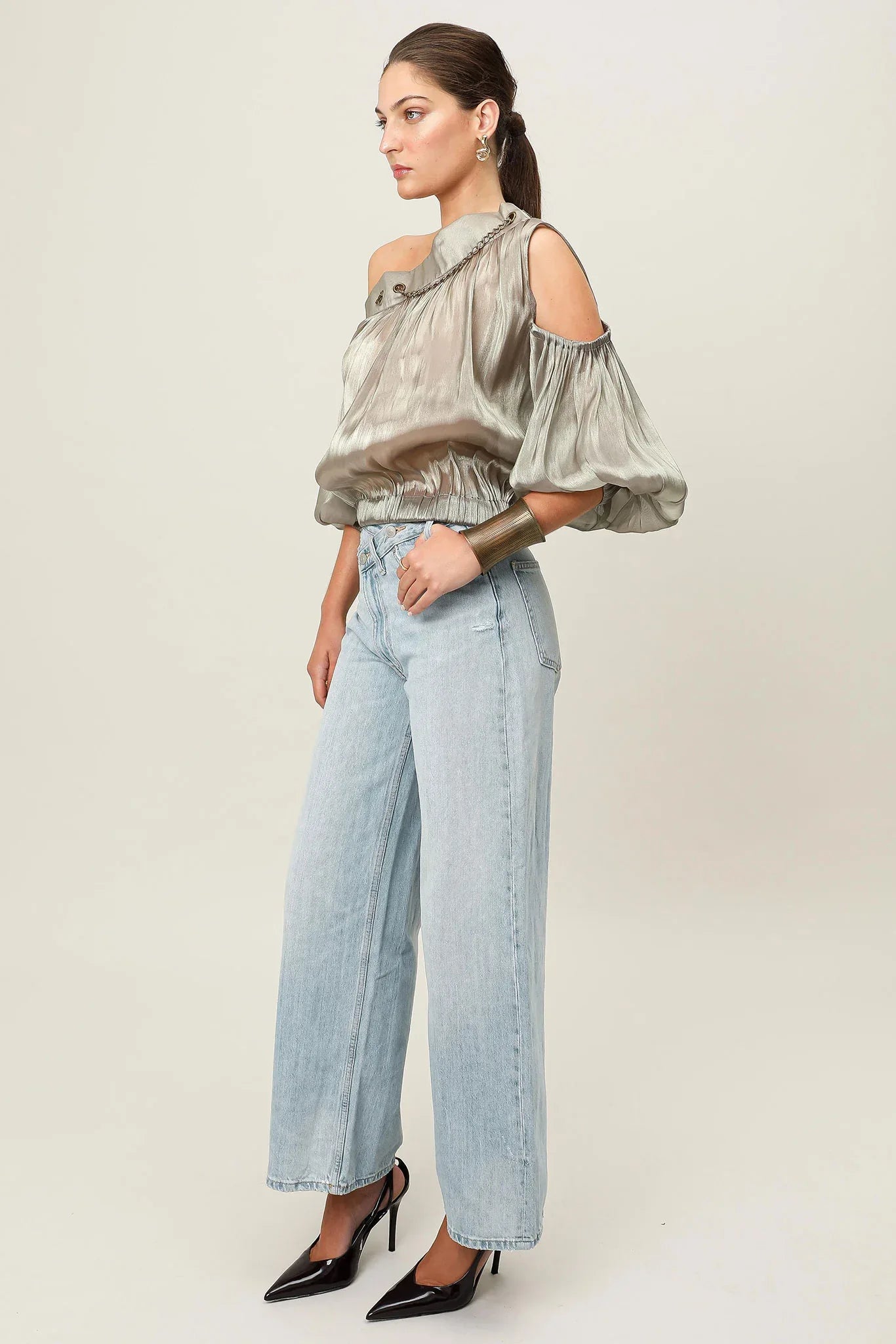Realm Origin Etoile Top in metallic bronze, showcasing its stylish design and shimmering fabric.
