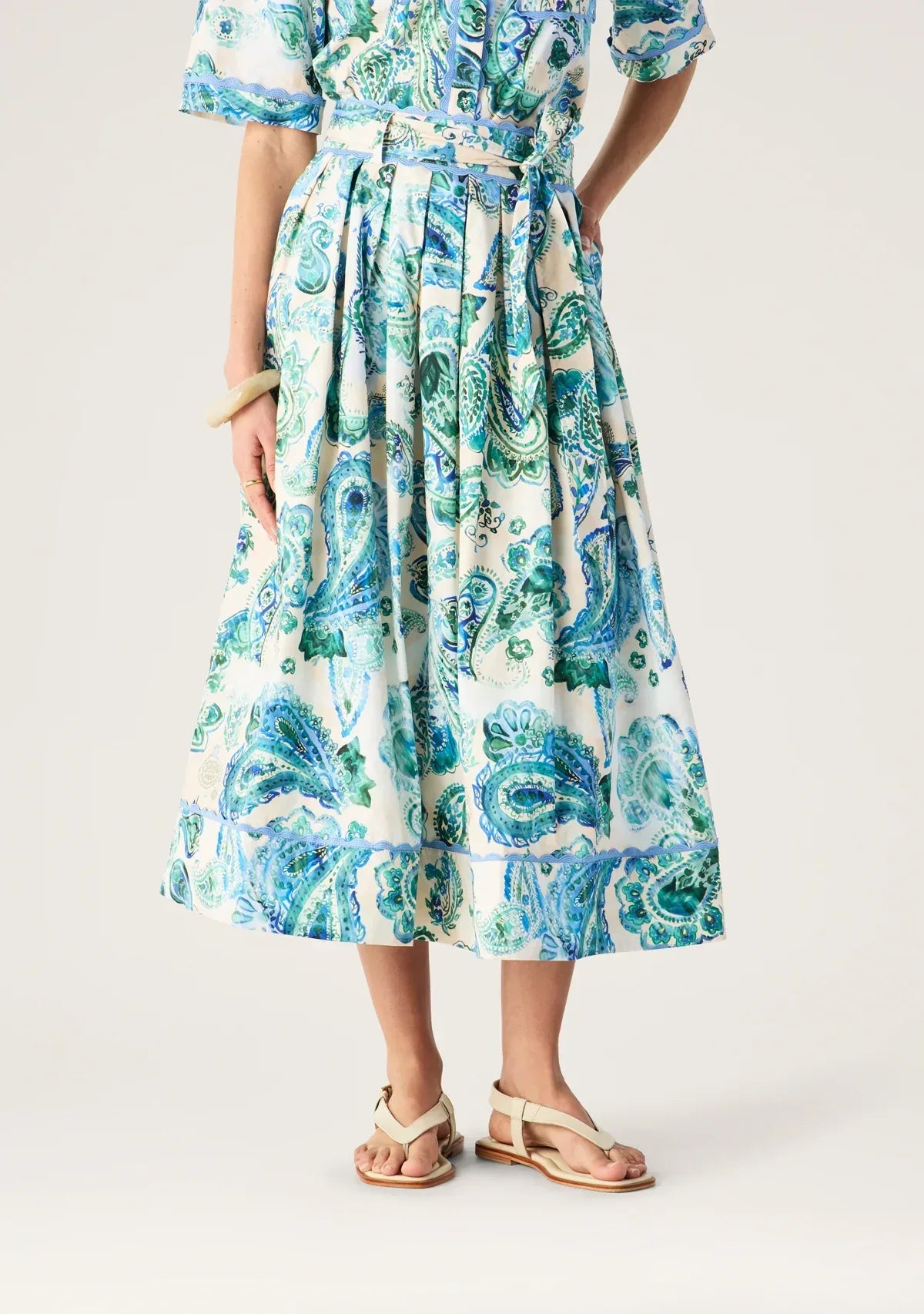 Mos the Label Opaline Midi Skirt in a flowing silhouette with a soft fabric and elegant design.