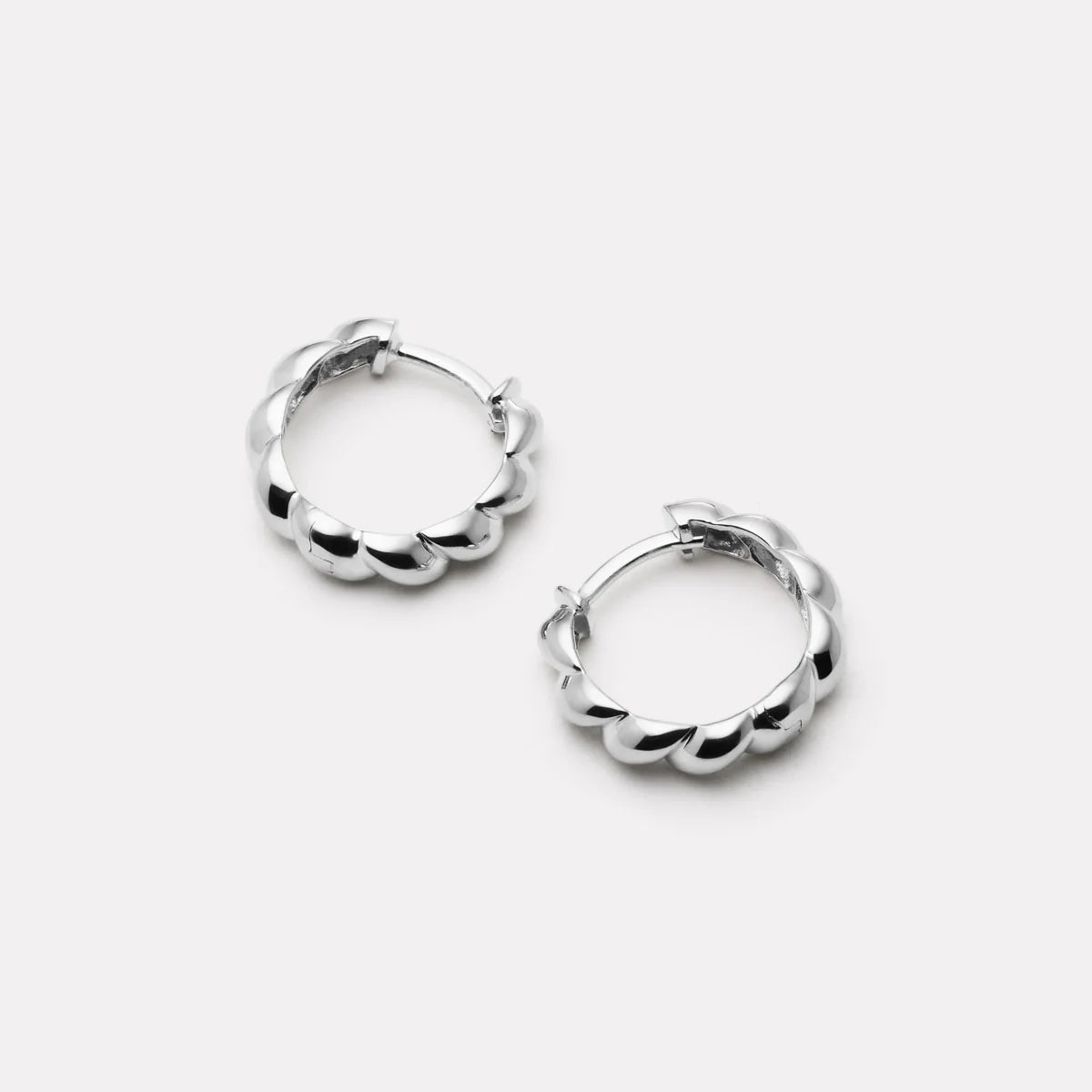 Najo - Zippy Twist Huggie Earrings