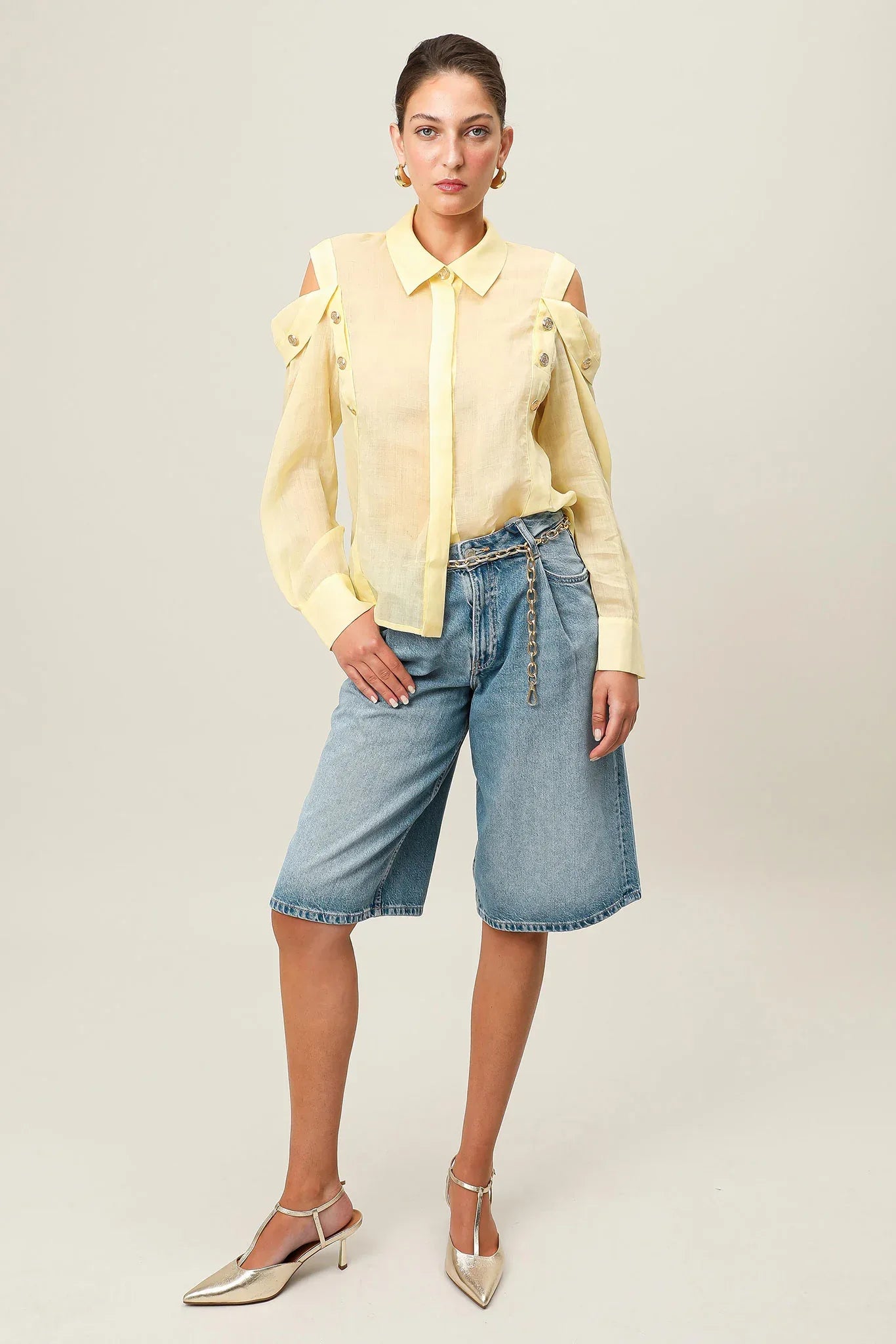 Yellow Realm Origin Vivre Shirt with a relaxed fit, featuring a casual design and soft fabric, displayed on a plain background.