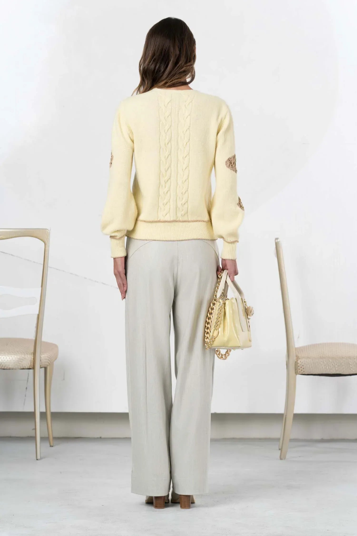 Elisa Cavaletti knitted sweater in white and yellow with a textured pattern, long sleeves, and a cozy fit.