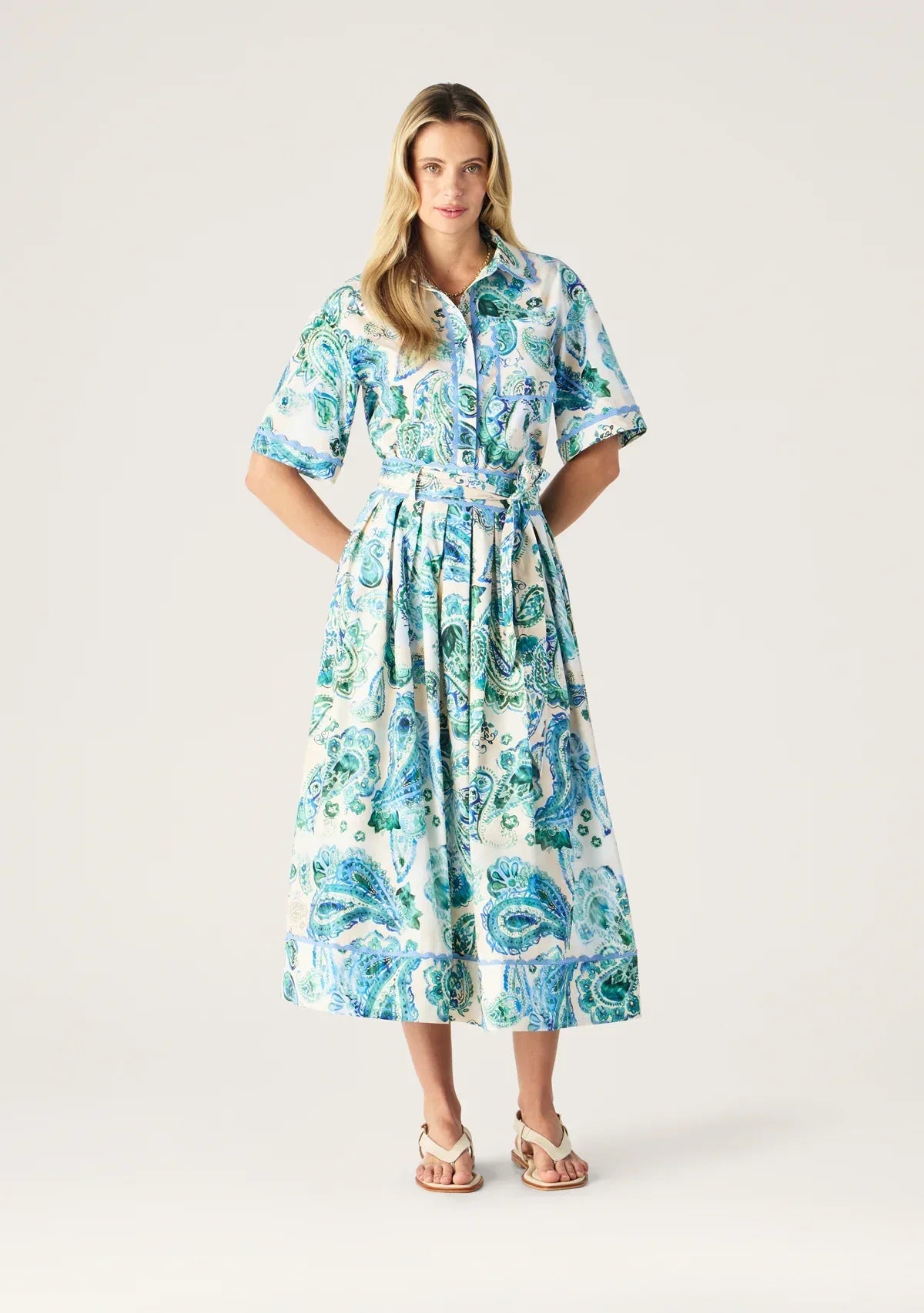 Mos the Label Opaline Midi Skirt featuring a flowy design and soft fabric in a light color.