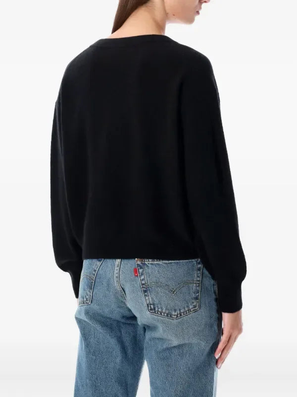Black American Vintage Raxow sweater with 18V neck, made of soft knit fabric, displayed flat.