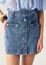 Aveline Denim Skirt by Mos the Label, featuring a classic cut and light blue wash, displayed on a neutral background.
