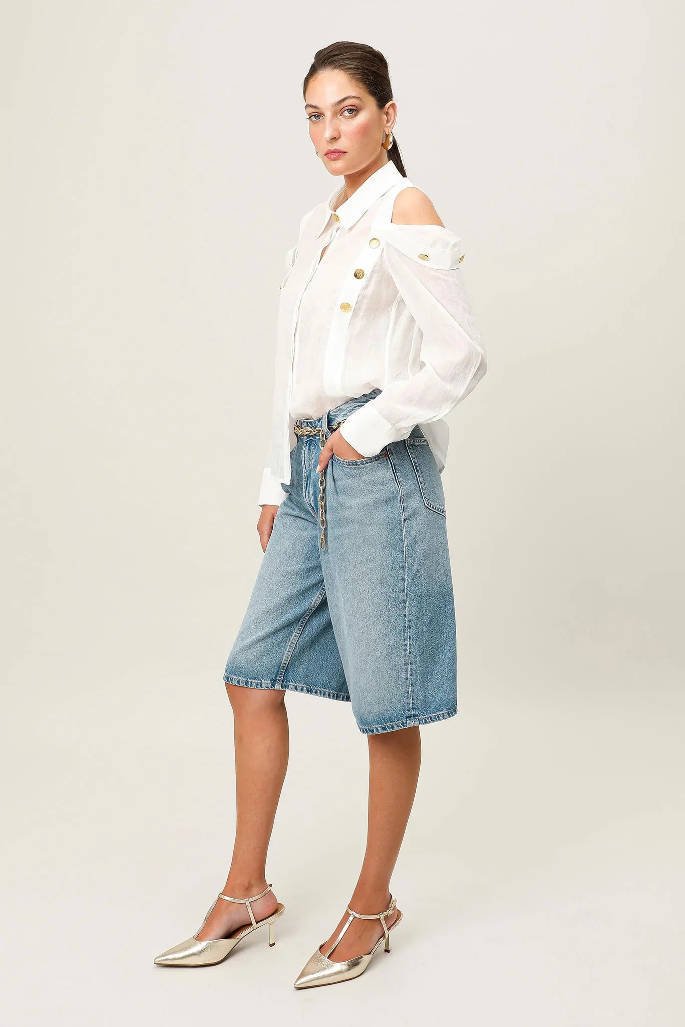 White Realm Origin Vivre Shirt displayed flat, showcasing its classic collar, buttons, and clean fabric texture.
