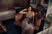 Mos the Label Prismic Print Maxi Dress with strappy design, featuring vibrant, geometric patterns and flowing fabric.